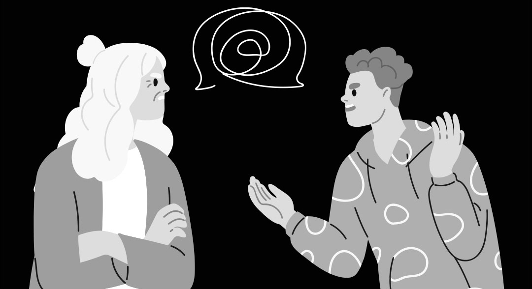Dos personas conversando y gesticulando mientras hablan de su conflicto